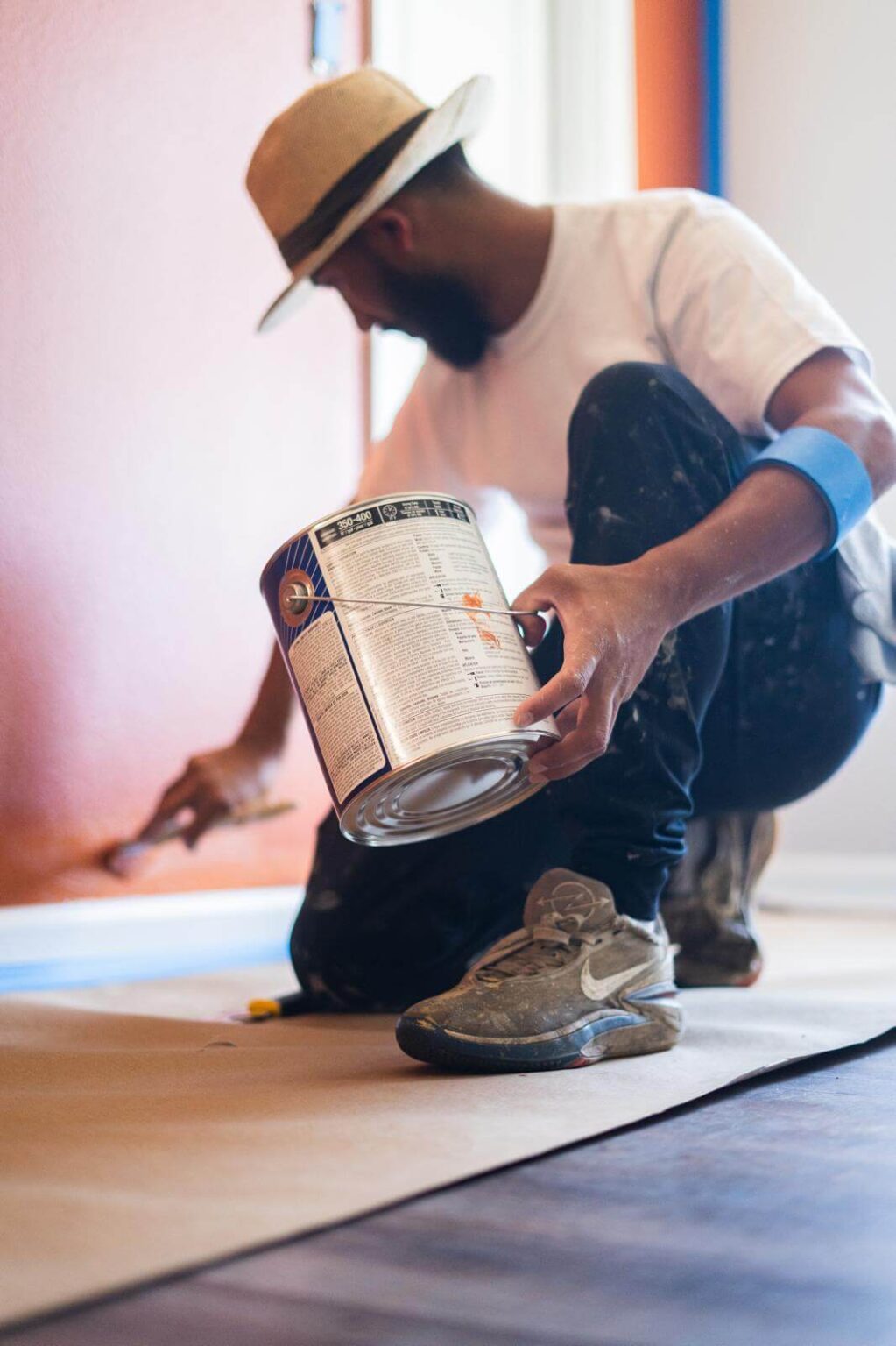 Man painting trim